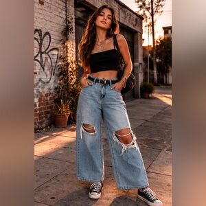 High-Rise Light Blue Wide-Leg Distressed Jeans